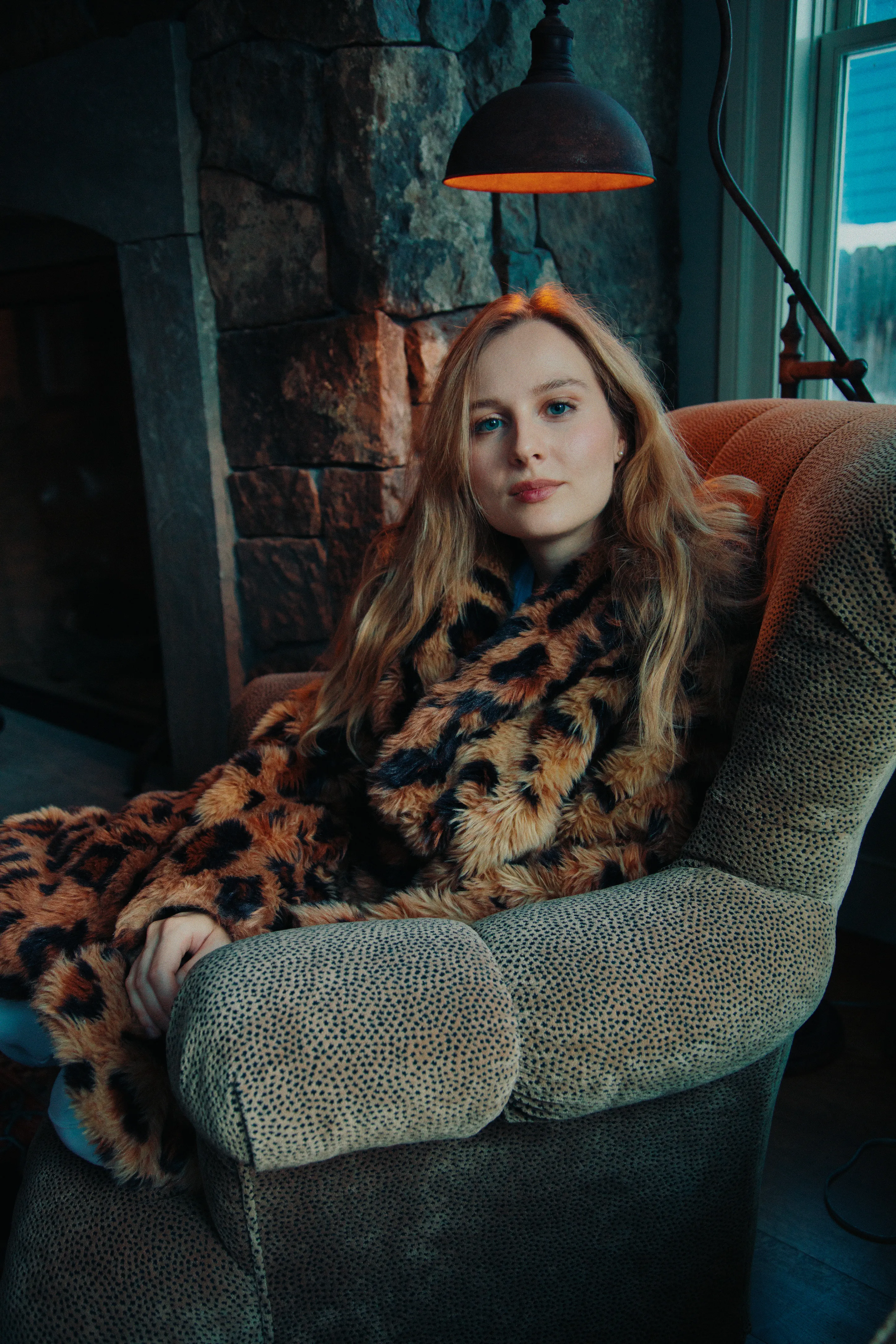 Portrait of woman sitting in chair